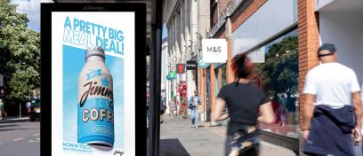 A Digital Out-of-Home advertising campaign from Jimmy's Iced Coffee displayed on a bus shelter in London